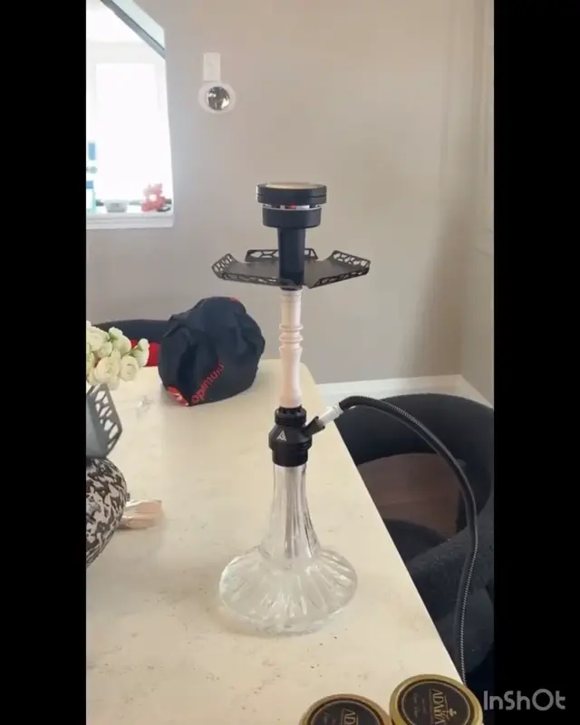 Hookah set up and lit in a private room before guests arrive